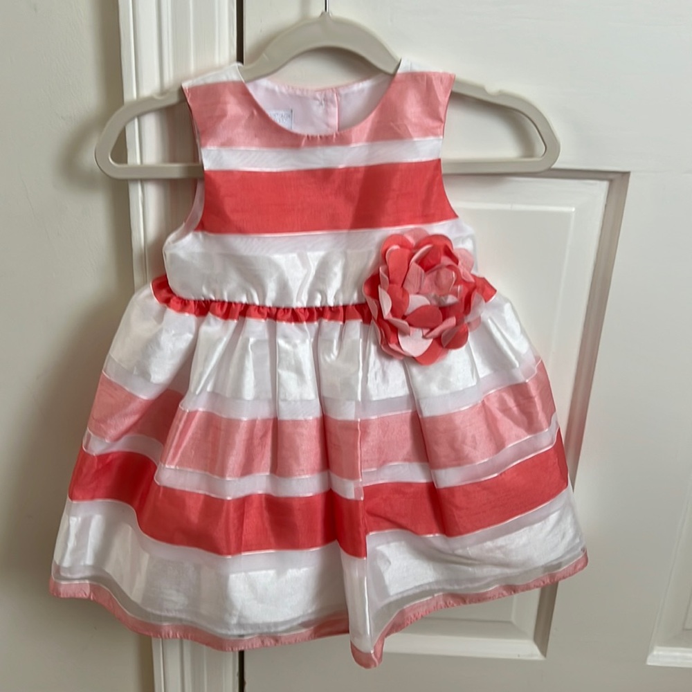 18 month old baby beautiful dress never worn.